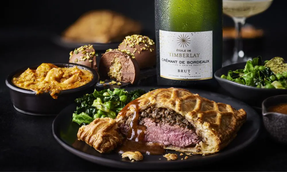Fillet Steak Beef Wellington,&nbsp;King Prawn & Lobster Thermidor Gratins,&nbsp;Pistachio and Chocolate Spheres and a bottle of Cr&eacute;mant de Bordeaux
