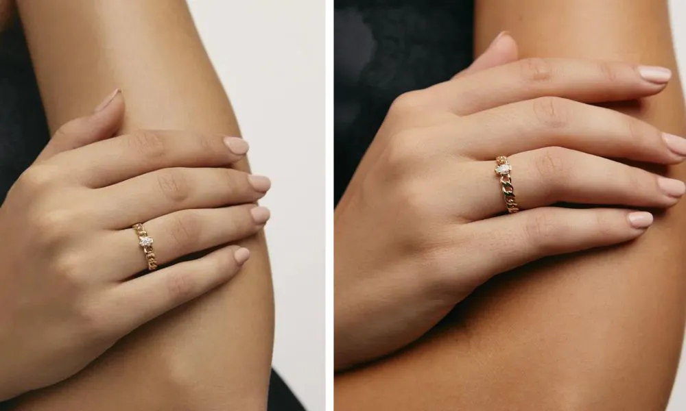 gold chain styled band with small diamond in the centre 