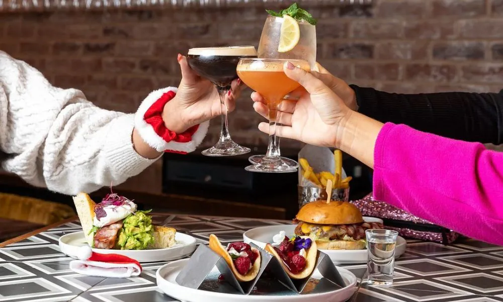 Cheersing cocktails with tacos