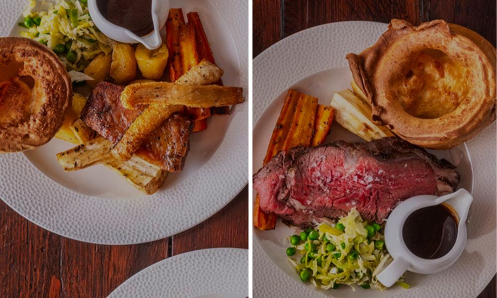 plates of roast dinners at The Fighting Cocks