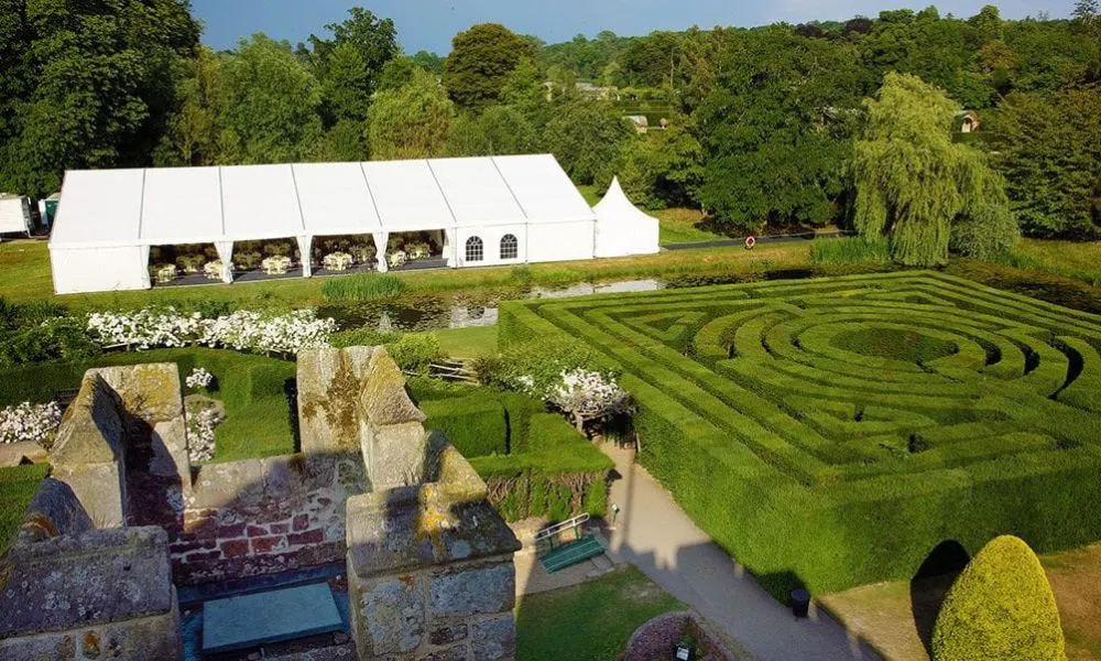 marquee in a garden with outdoor maze area