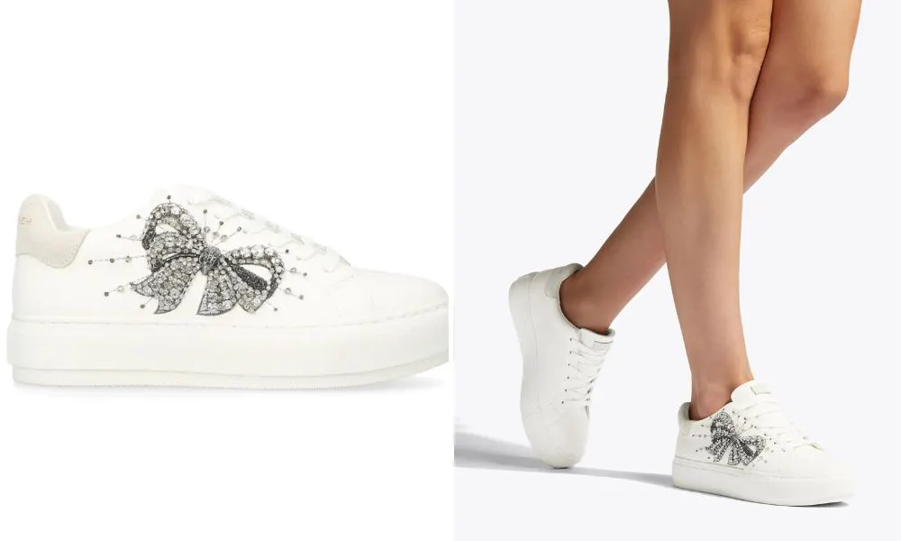 Chunky white trainers with crystal emblishment in the shape of a bow