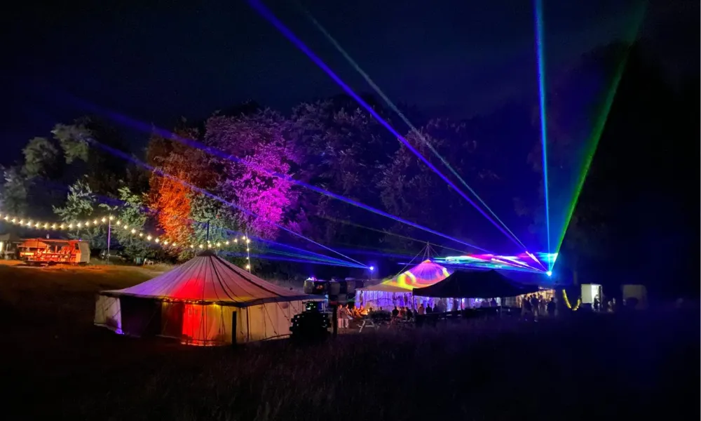 bright festival lights at wedding after dark