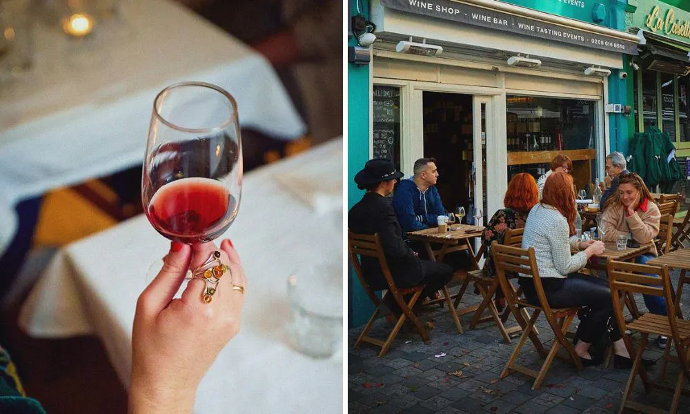 glass of red wine and people sat outside drinking wine