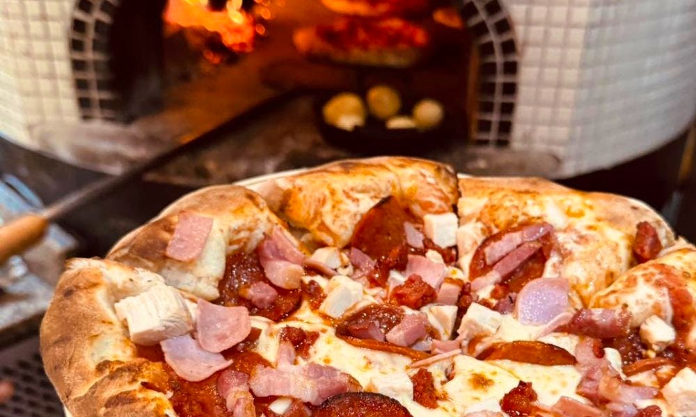 a woodfire meat feast pizza