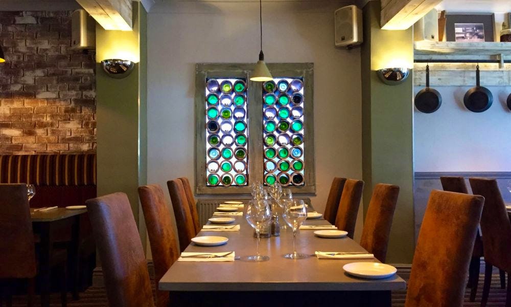 a dining room set for dinner