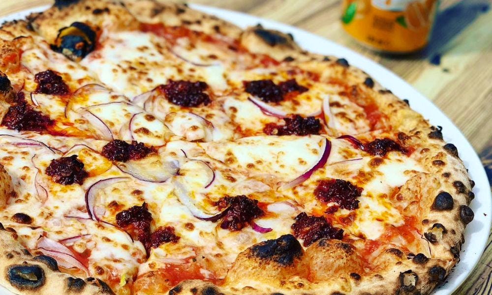 pizza topped with onion