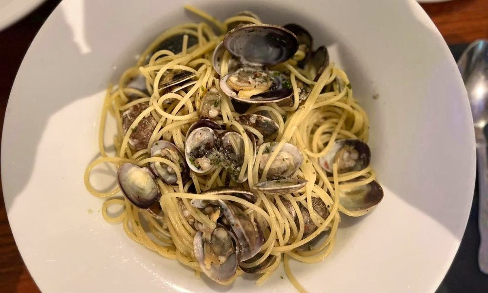 a bowl of seafood pasta