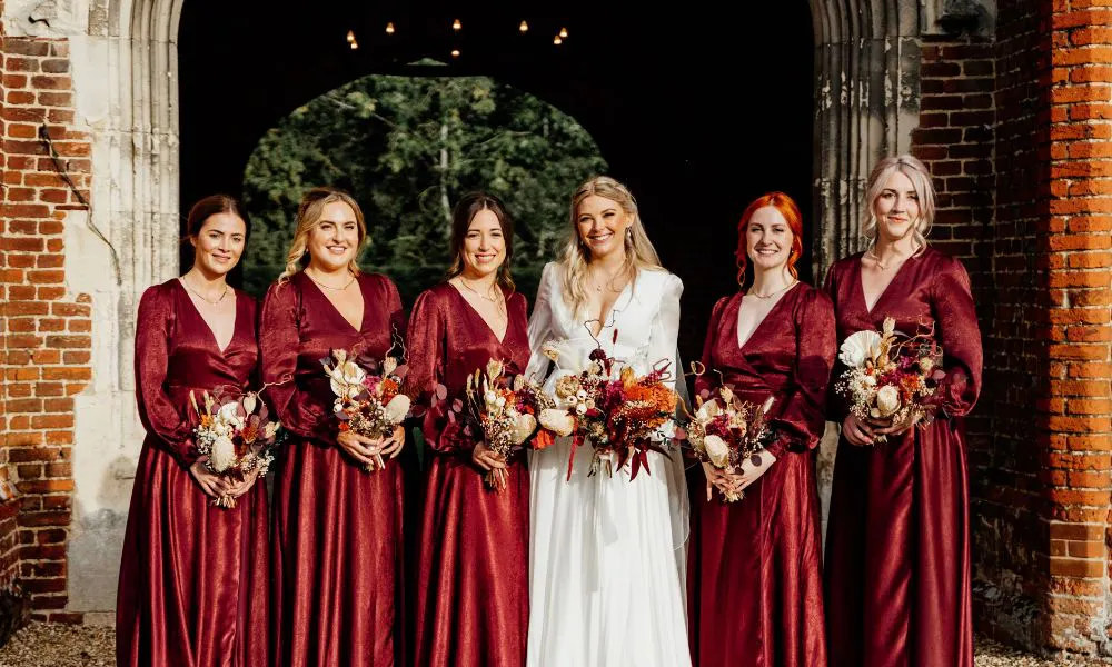 Autumn wedding with bridesmaids' dried flower bouquet
