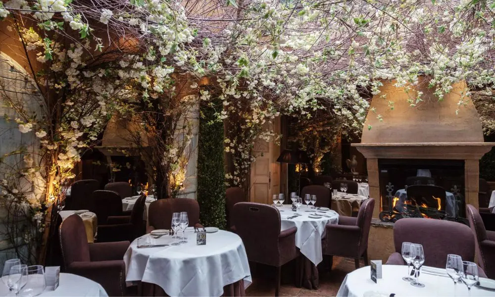 main dining room decorate with trees and blossoms