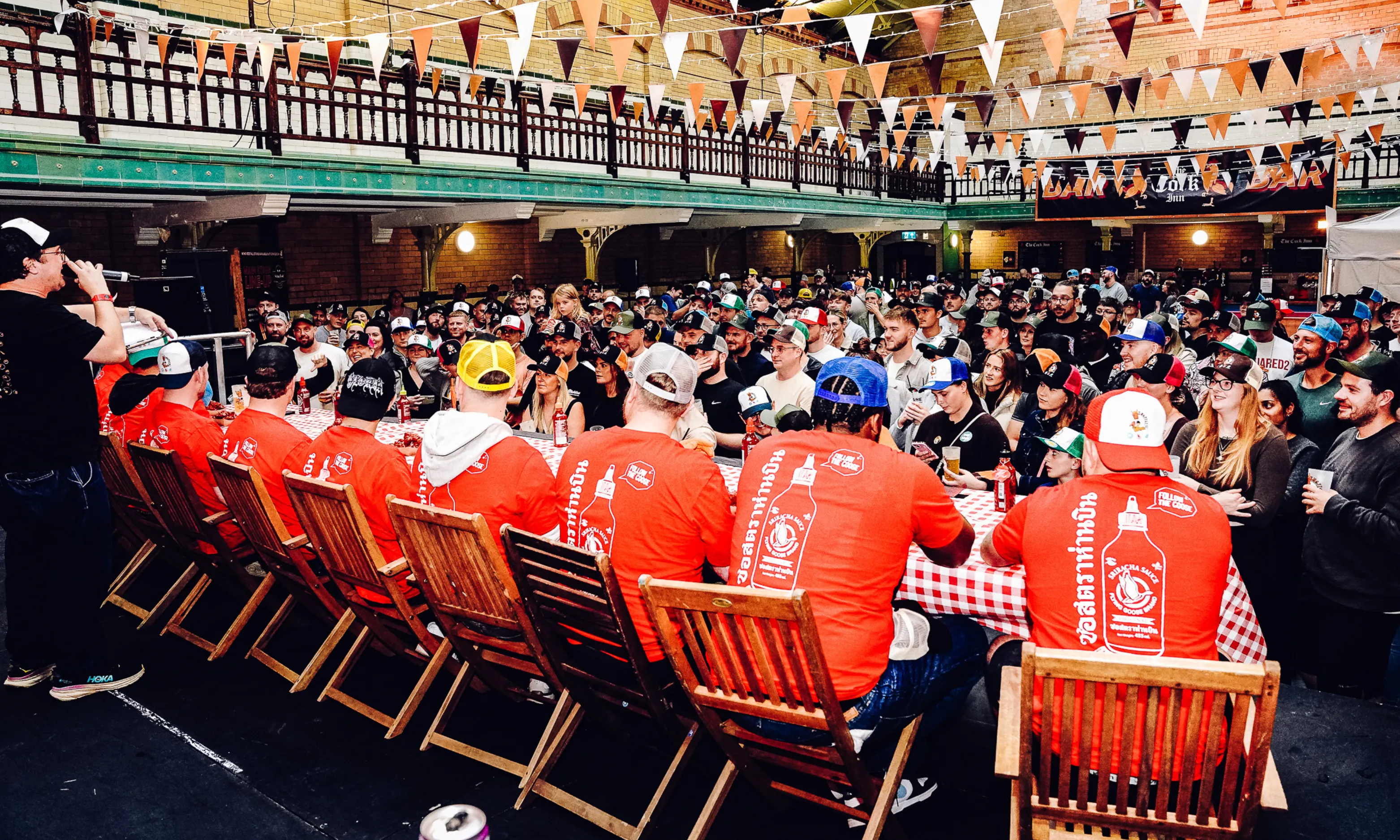chicken wing eating competition on a stage