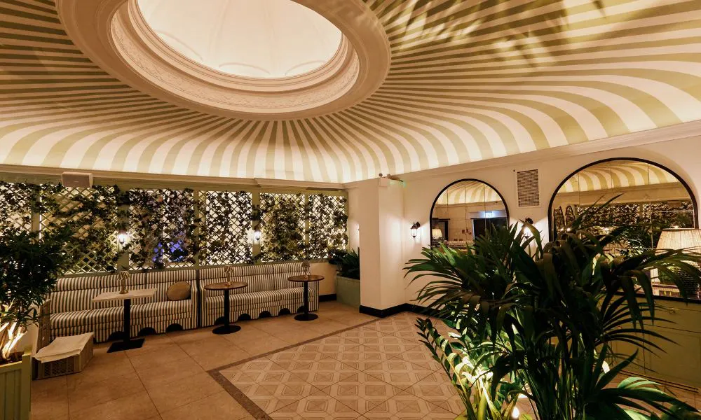 private room with a striped ceiling and skylight