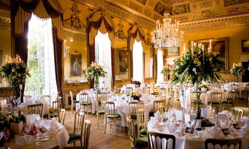 lavish, regal interiors set up for a wedding breakfast