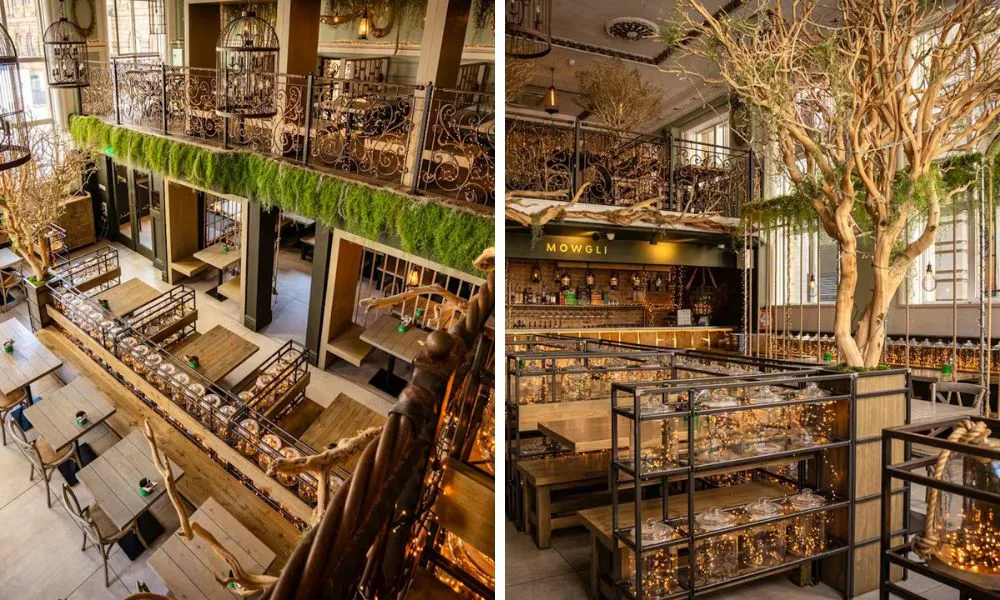 restaurant with green trees and wooden tables