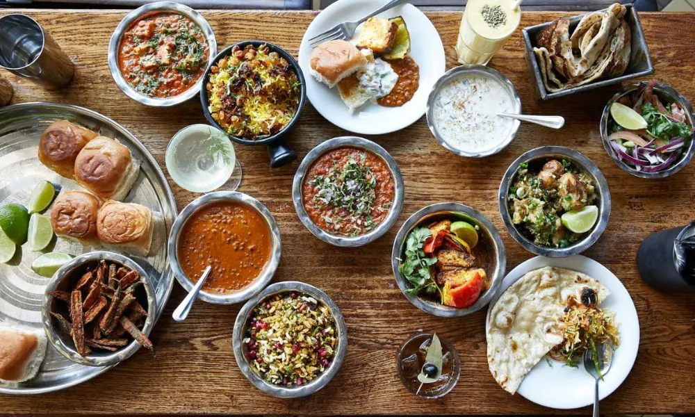 a dozen plates of food on table