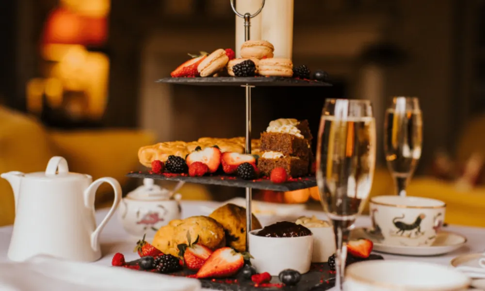 afternoon tea with two glasses of sparkling wine
