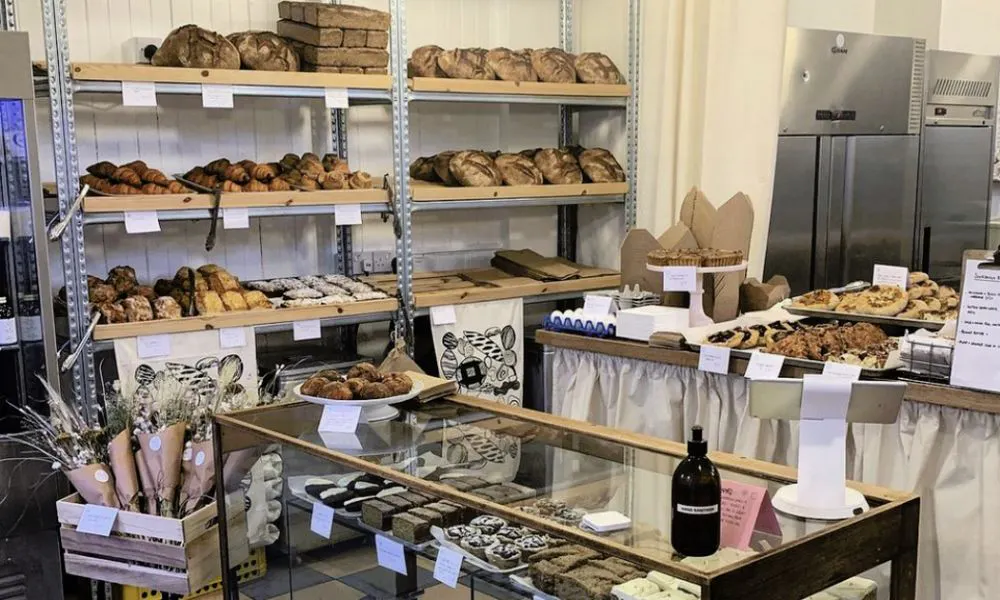 bread on shelves and on display on table