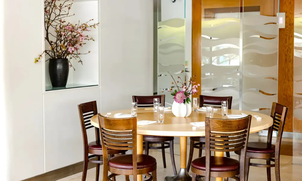 small table in light filled room at nobu Mayfair