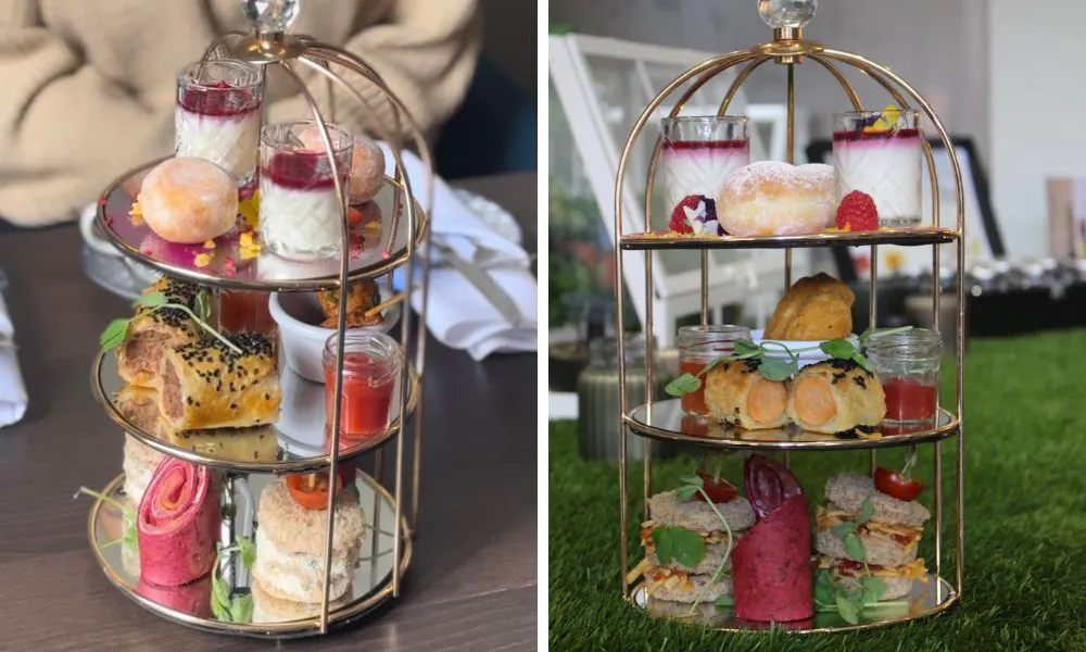 afternoon tea stands of cakes, sausage rolls and sandwiches