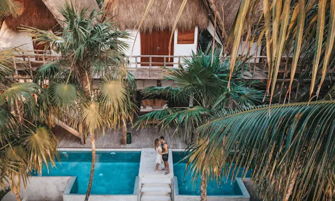 Engaged couples are booking 'earlymoon' trips to escape the hassle of wedding planning