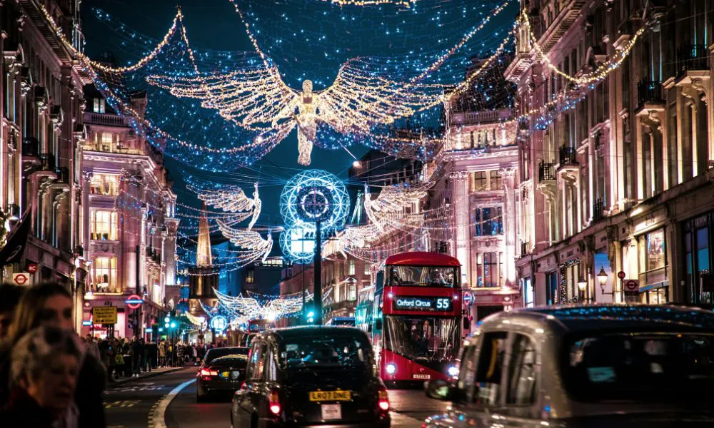Central london with Christmas lights and red bus