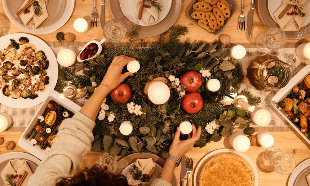 Table with veggie pie, asparagus and candles