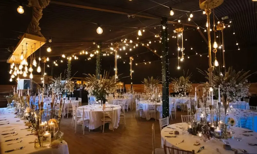 Fairy lights over the tables at Stock Farm Barn