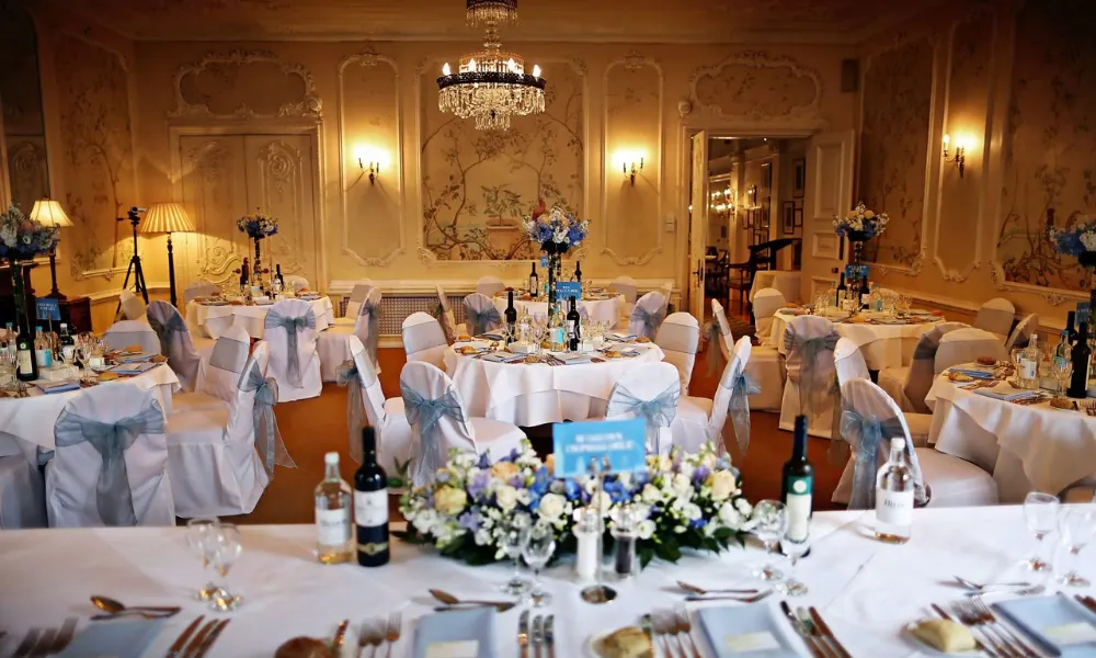 wedding breakfast with covered chairs 