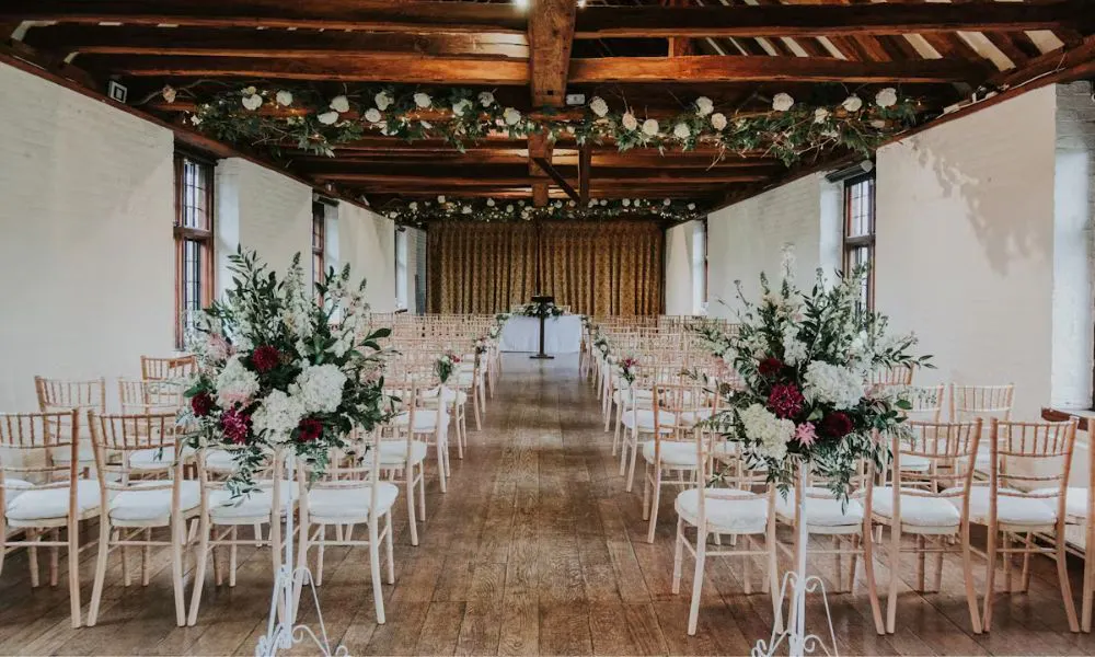 A quaint decorated aisle at Tudor Barn Eltham