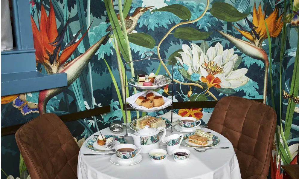afternoon tea for two with bright wallpaper