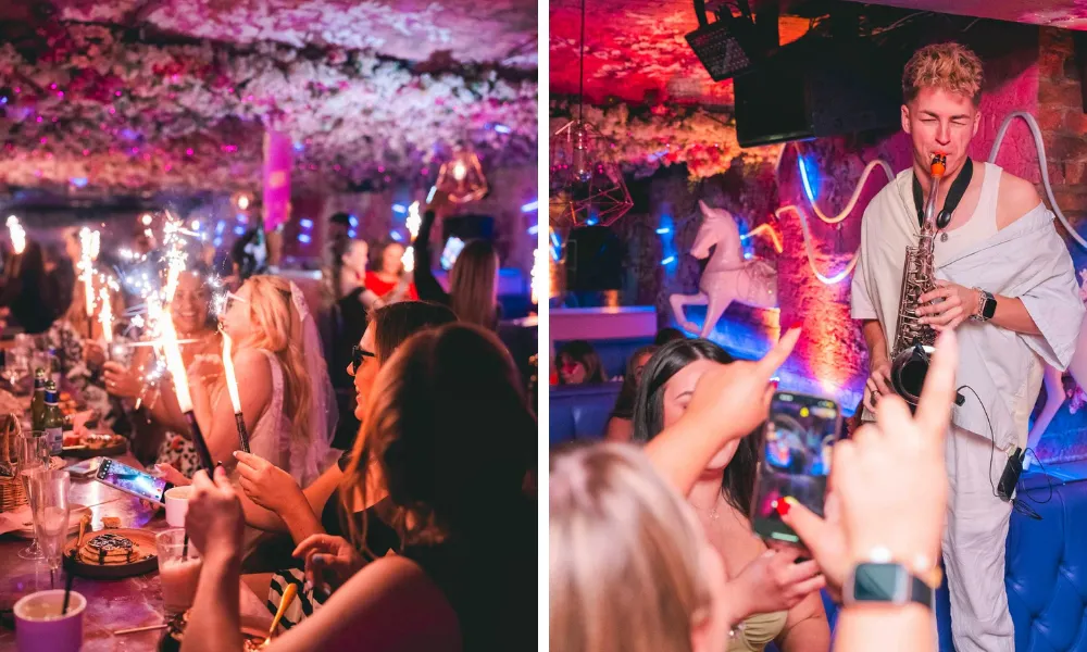 people enjoying brunch with sparklers and saxophone