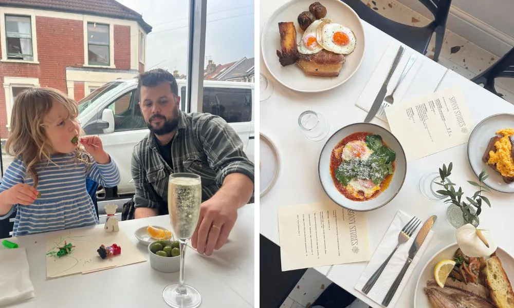 Child eating olives, and a selection of brunch plates on a table