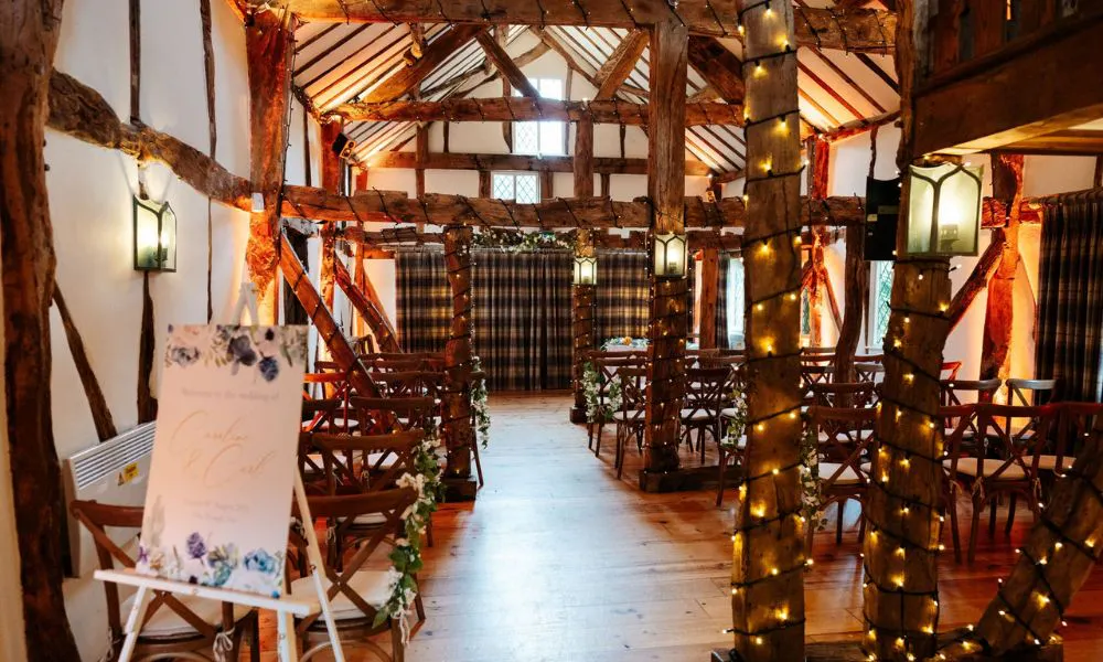 a cosy, barn wedding ceremony set up
