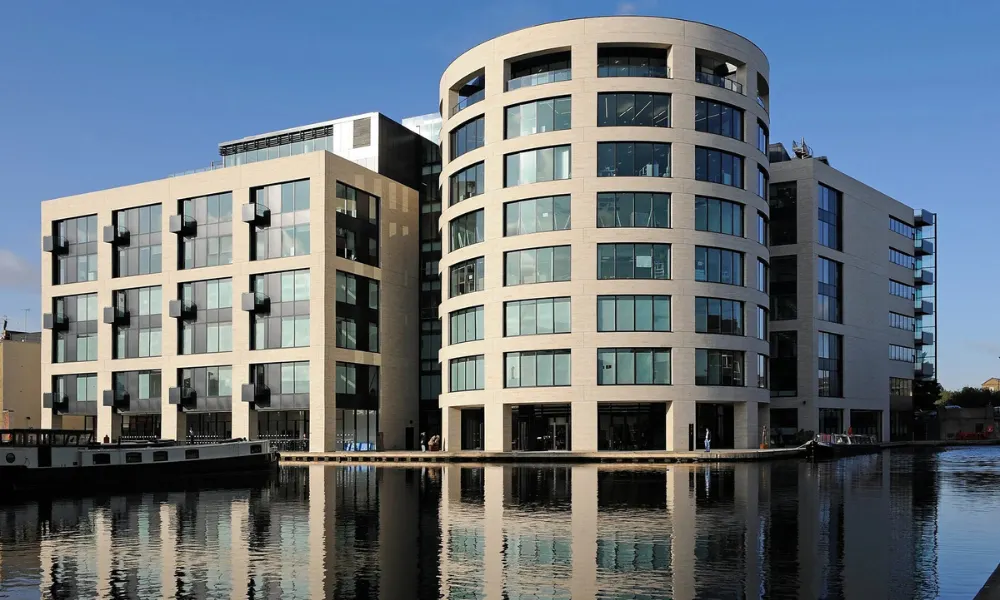 Large white Kings Place building by canal