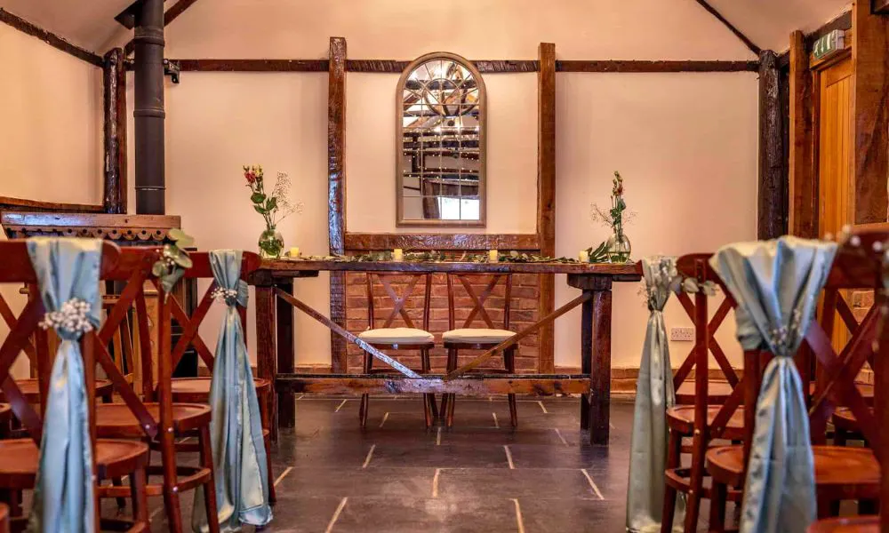 a rustic wedding ceremony set up