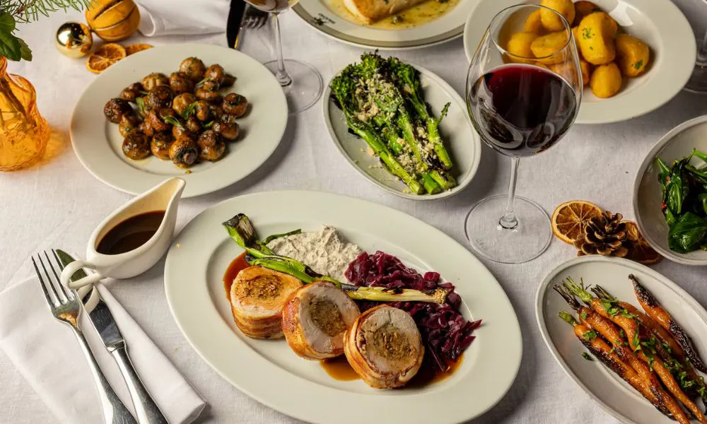 a festive spread of turkey ballotine and sides