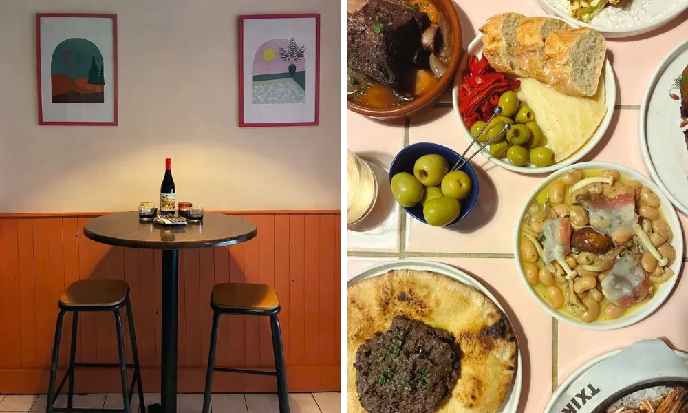 high stool table with bottle of wine and selection of spanish tapas