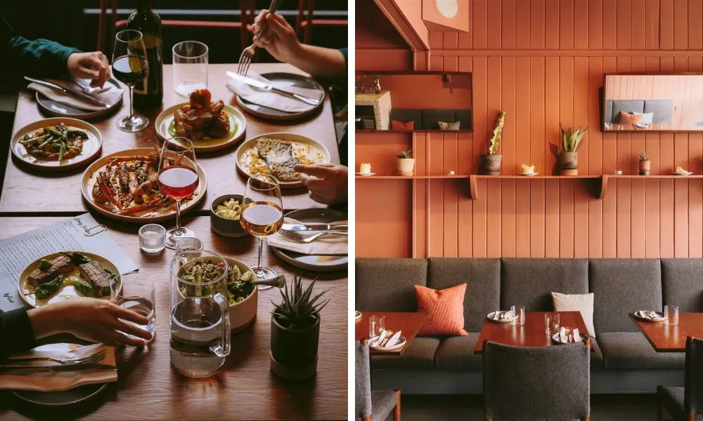 a table packed full of small plates and drinks, and elegant, burnt orange restaurant interiors