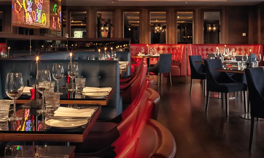 chez mal dining room with red banquettes