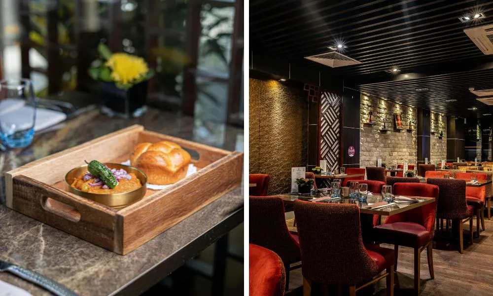 a tray of curry and bread and a sleek restaurant dining room