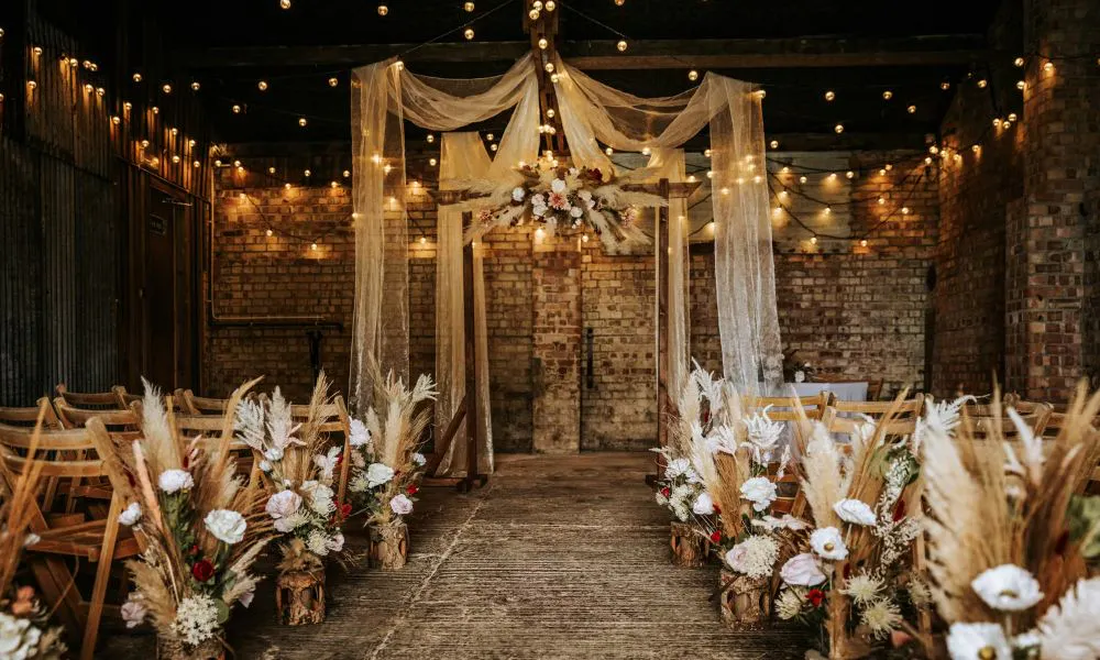 a rustic barn setting for a wedding ceremony
