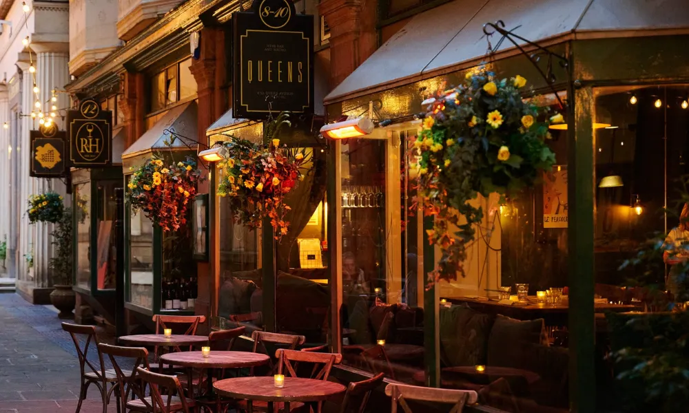 exterior at queens bistro, with hanging flower baskets