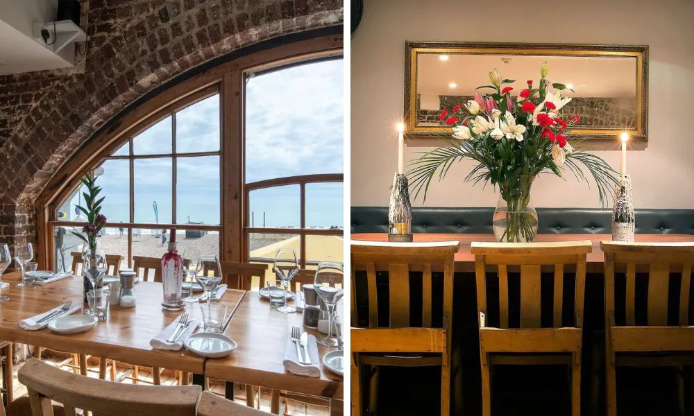 dining table with sea views and vase of flowers with candlesticks