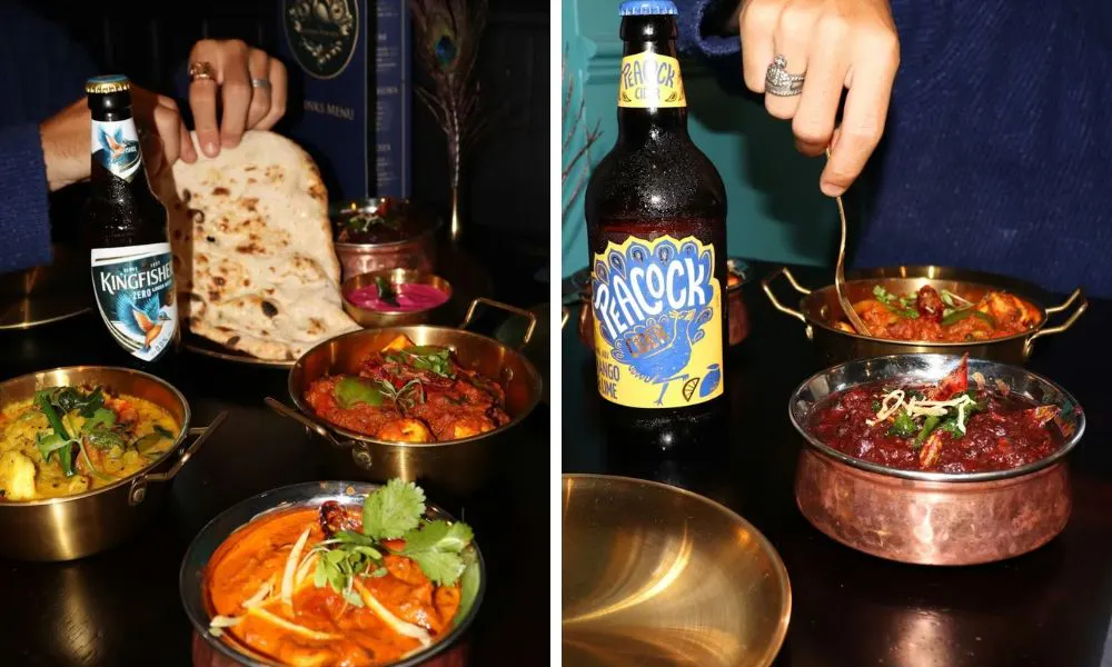 naan bread with curries and bottle of beer