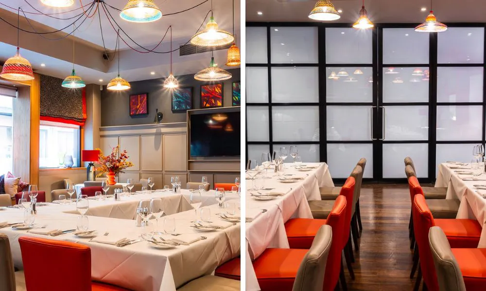 private dining room with orange seats and television