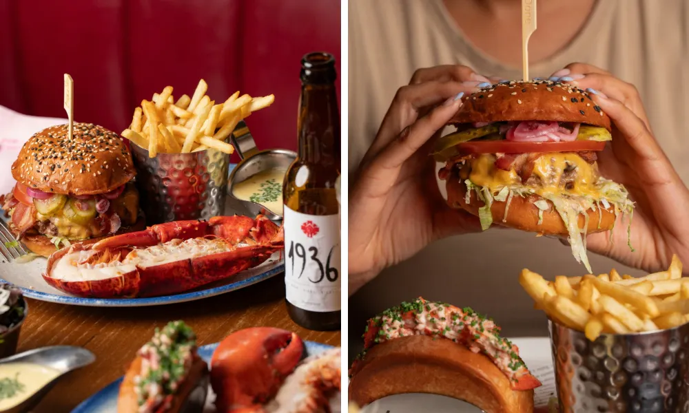 Large burger on a plate with half a lobster