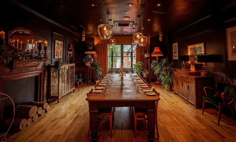 banquet-style table for group dinners, in a cosy private dining room