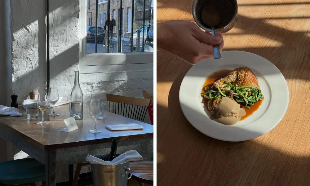 dining table with wine bucket and chicken with jus