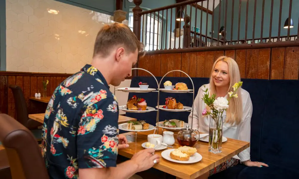 two people enjoying a relaxed afternoon tea