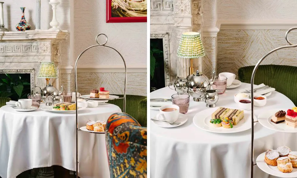 sleek, white-clothed tables set for afternoon tea